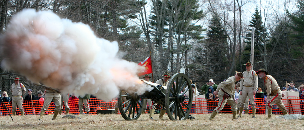 Brass cannon fires